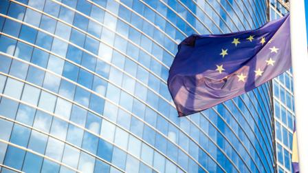 European flag against skyscraper