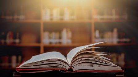 Stack,Of,Books,In,The,Library