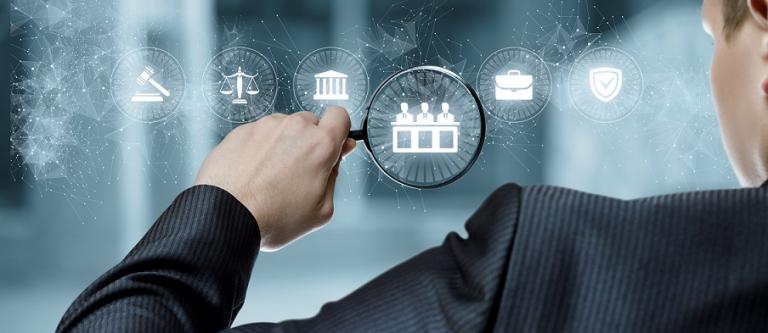 Lawyer,Examining,A,Virtual,Computer,Screen,With,A,Magnifier.