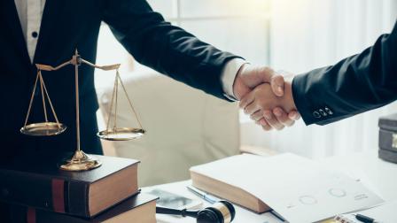 Businessman,And,Lawyer,Shaking,Hands.