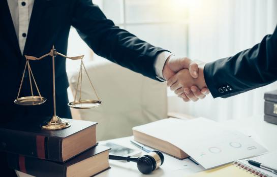 Businessman,And,Lawyer,Shaking,Hands.