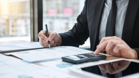 Businessman,Accountant,Working,Audit,And,Calculating,Expense,Financial,Data,On