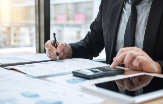 Businessman,Accountant,Working,Audit,And,Calculating,Expense,Financial,Data,On