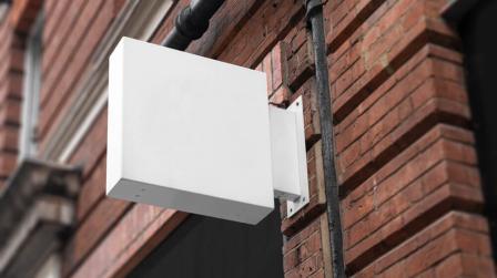 Cartel en la fachada de una comunidad de propietarios_img