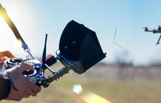 Male,Hands,Holding,Generic,Design,Dron,Remote,Controller,Doing,Some