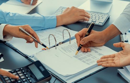 Auditor,And,Accountant,Team,Working,In,Office,,Analyze,Financial,Data