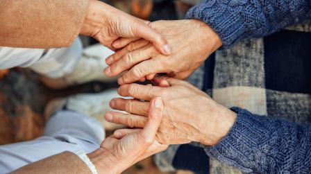 Cropped,Photo,Of,A,Mature,Couple,Holding,Hands.,Hand,In
