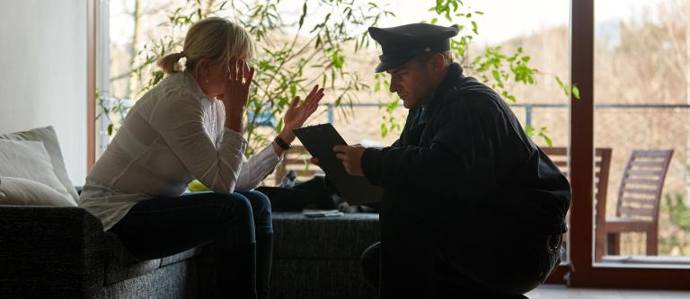 Psychologist,Of,The,Police,Talking,To,A,Victim,After,A