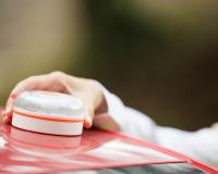 Young,Woman,With,Reflective,Vest,,Places,The,V16,Emergency,Light