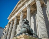 Bronze,Lions,On,The,Famous,Façade,Of,The,Spanish,Parliament