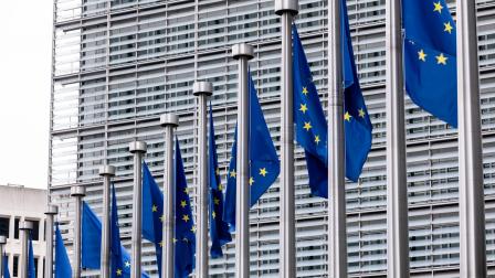 European,Union,Flags,Fluttering,In,The,Wind,In,Brussels,,Belgium