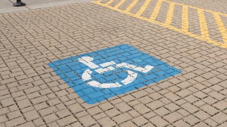 Horizontal,Photo,Of,A,Blue,Handicap,Parking,Sign,Painted,On