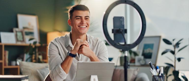 Man,,Influencer,And,Home,With,Smartphone,For,Social,Media,Or